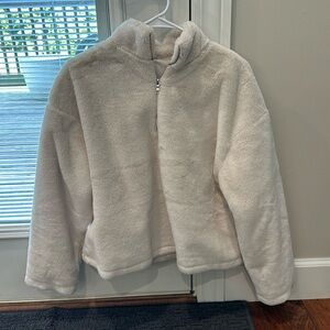 Fluffy zip up, very thick and warm. Perfect for fall and winter.